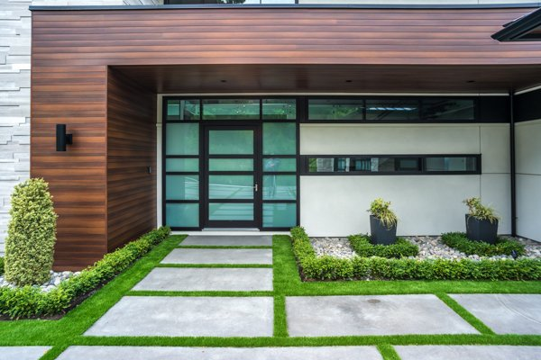 Lombard wood-look exterior panels installed around a modern entrance
